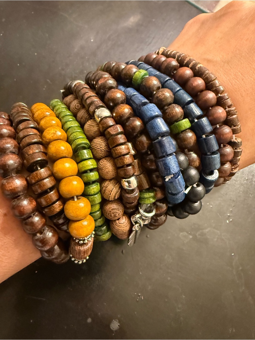 Stacked Wooden Bead Bracelets in Brown, Blue, Green & Mustard